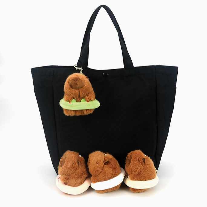 Capybara in a Tube Bag Charm